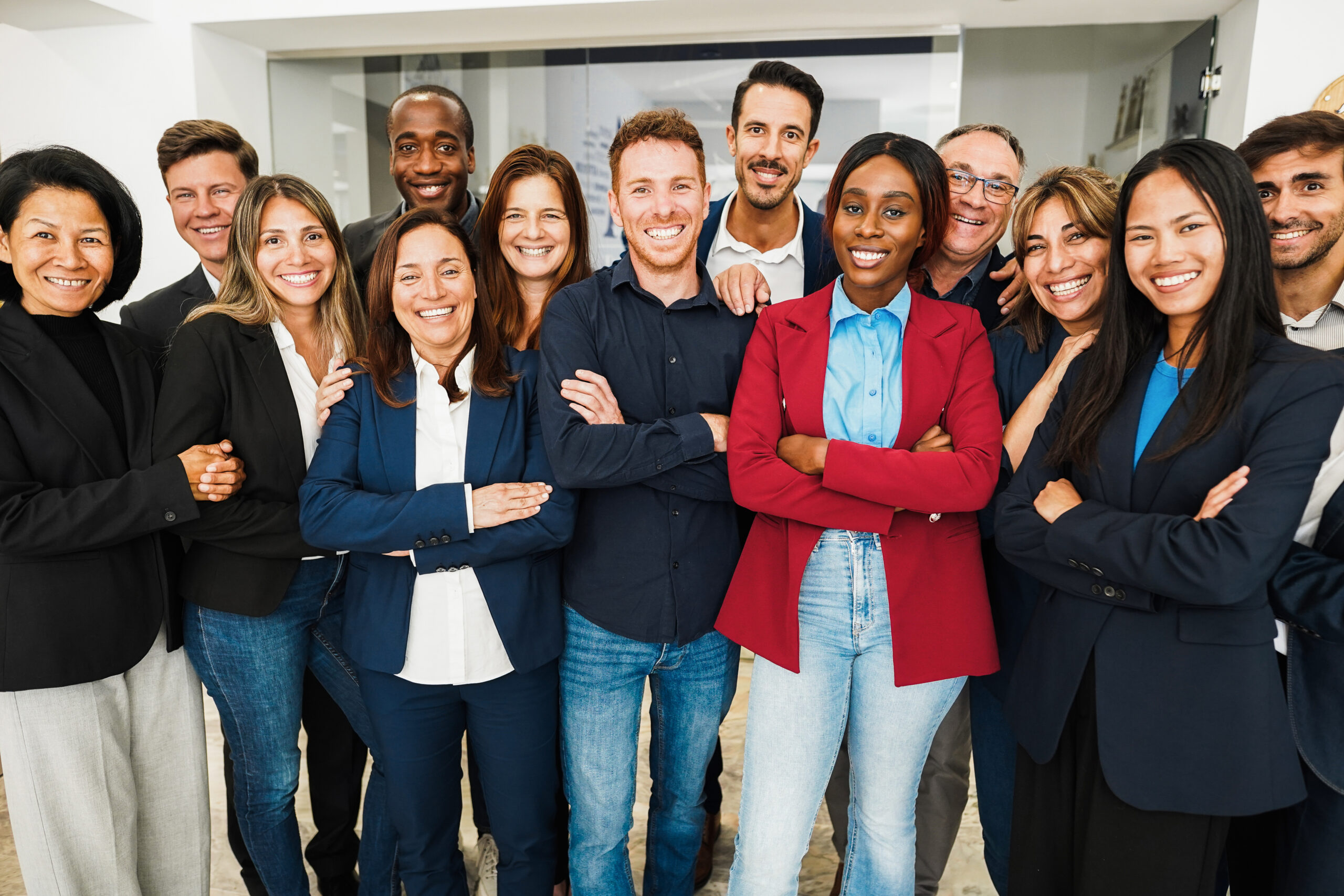 Illustration of a diverse team of SaaS sales professionals collaborating in an office setting, symbolizing effective recruitment for a successful sales team.