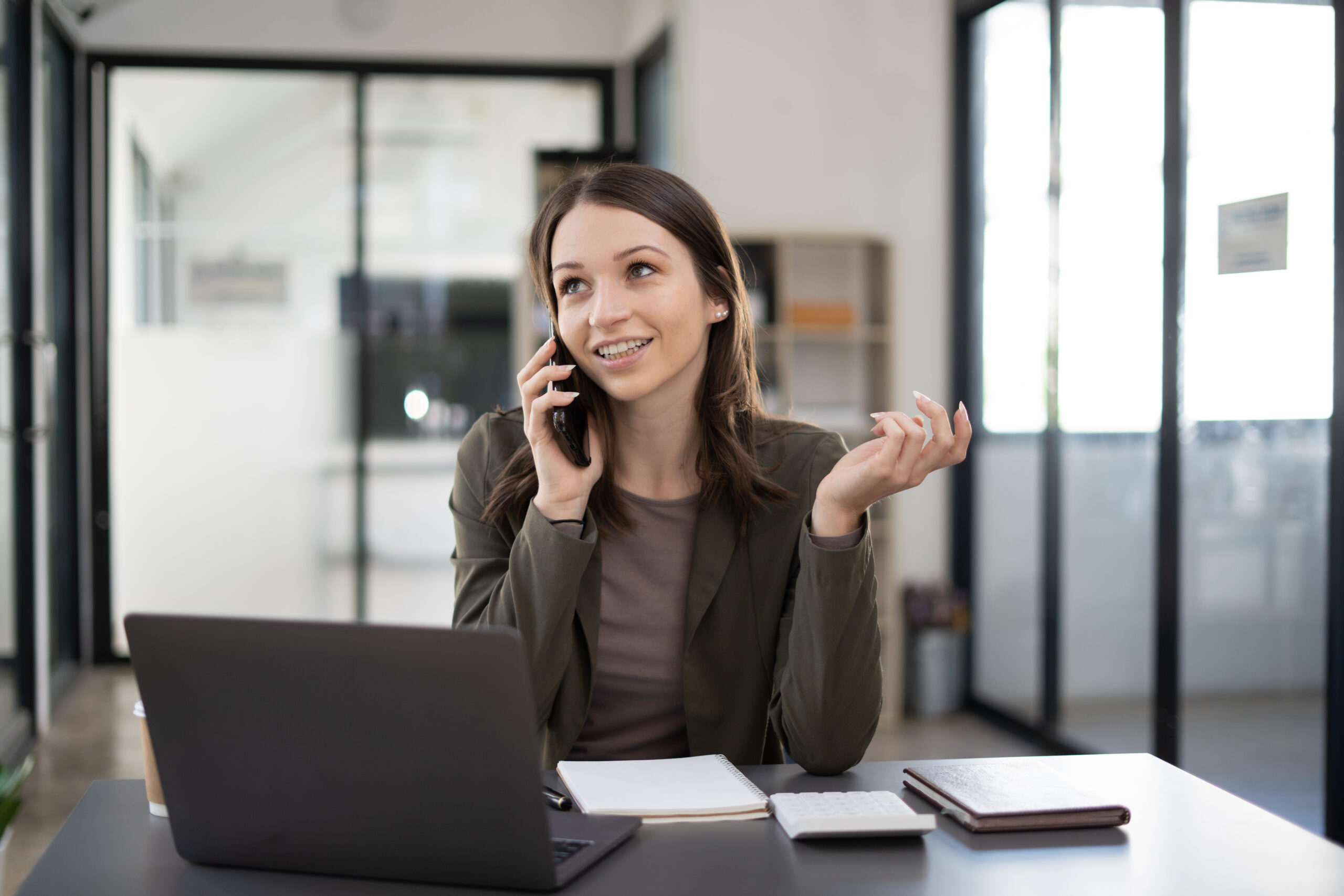 An inside salesperson working from their desk, making calls and sending emails to potential customers. They aim to build relationships and close deals remotely, highlighting the flexibility of inside sales.