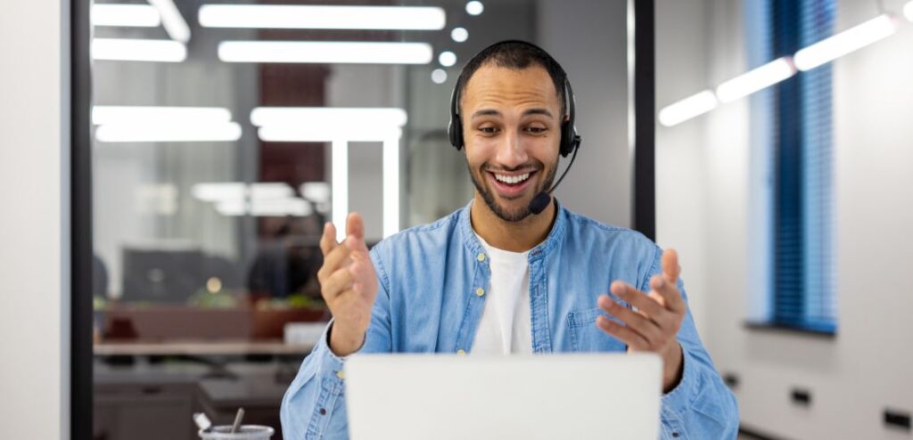 A SaaS sales representative engaging with a potential client over a video call, showcasing the remote nature of SaaS sales.