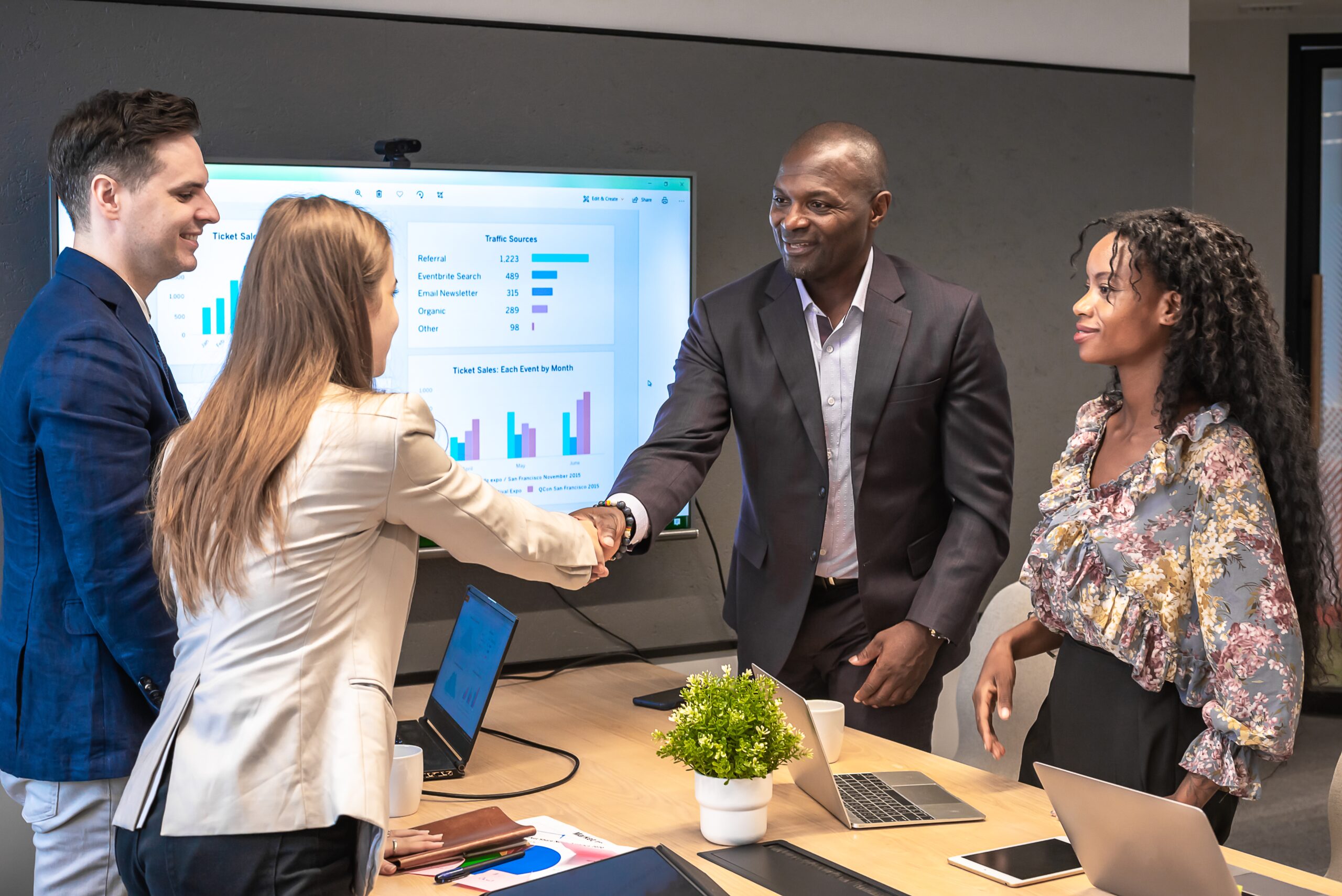 SaaS Sales Business man shake hands with partnerships or introducing themselves for first time meet.