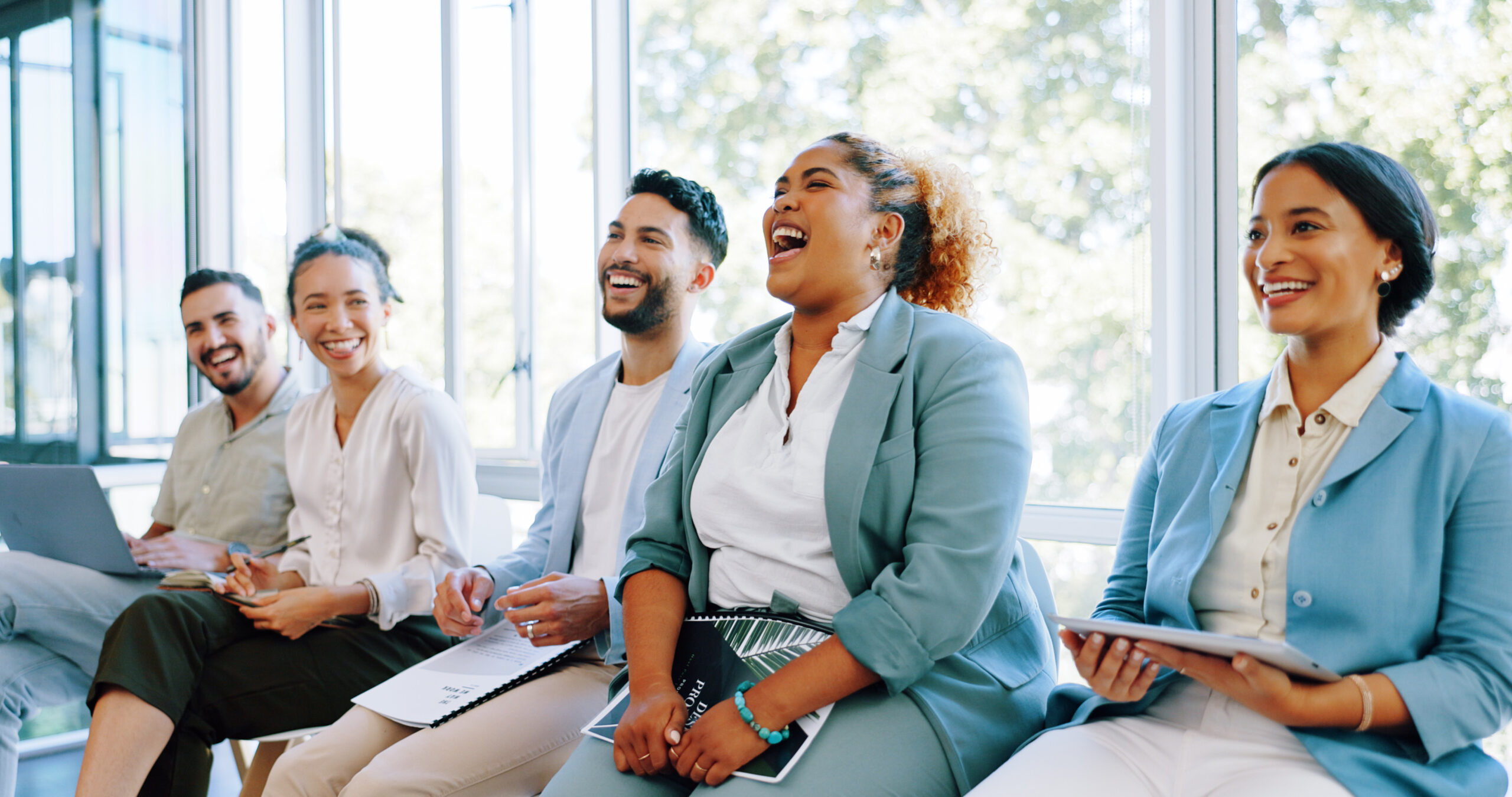 SaaS Sales Interview, question and training with a business black woman raising her hand to answer during a me.