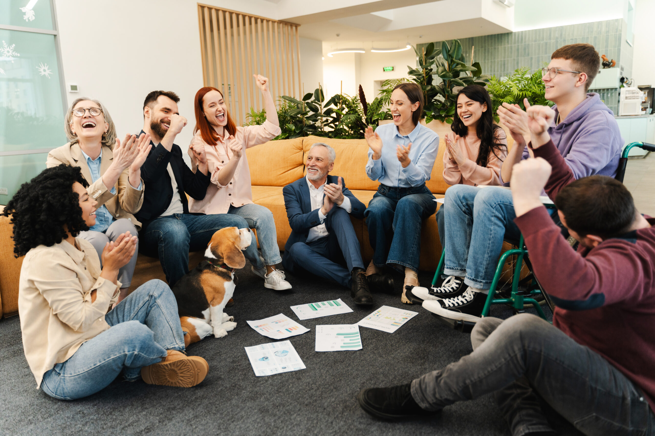 Smiling, happy SaaS manager, colleagues, multinational Sales business people working together gesturing winners